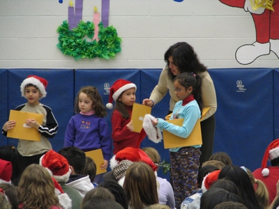 Claudia receiving award